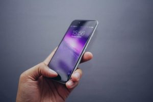 holding phone 